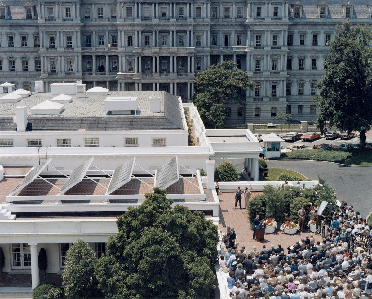 Jimmy Carter installs solar panels on the White House