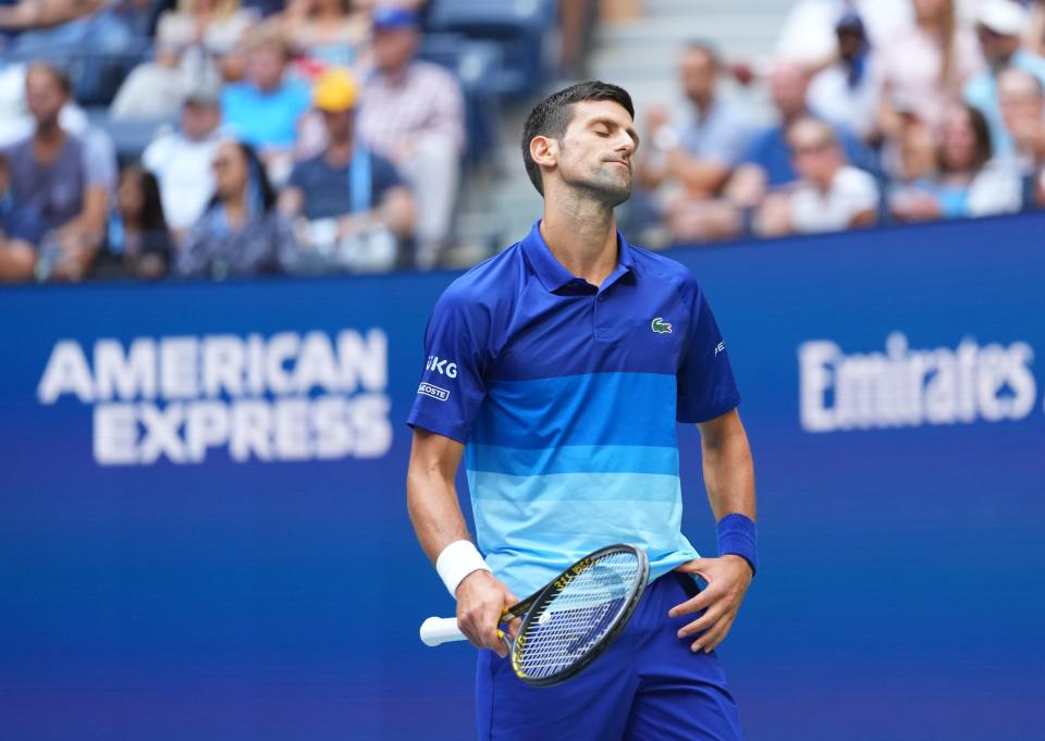 Novak Djokovic reacts to a missed shot against Daniil Medvedev during the U.S. Open men's singles final.