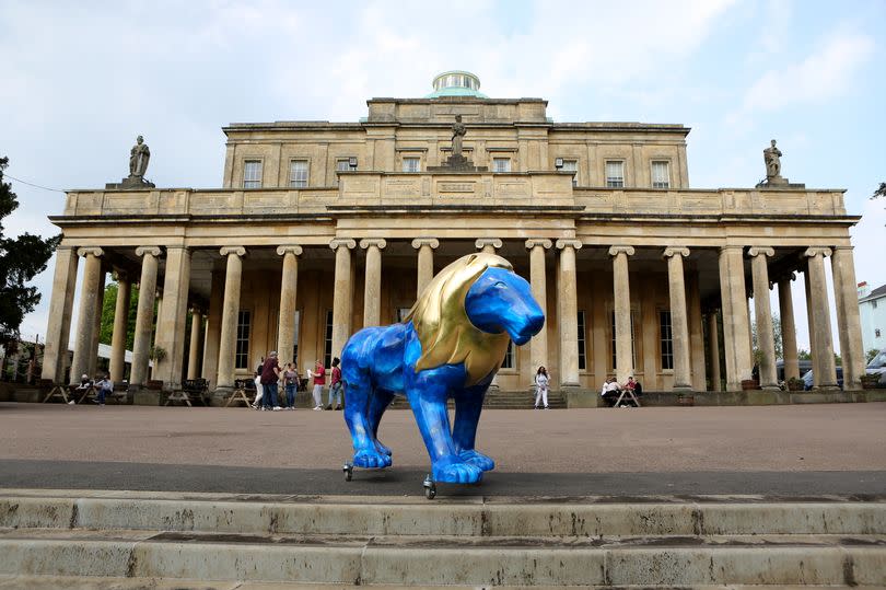 One of the majestic lions at Pittville Park in Cheltenham