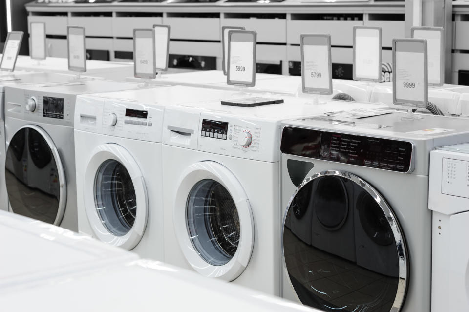 Row of washing mashines in appliance store