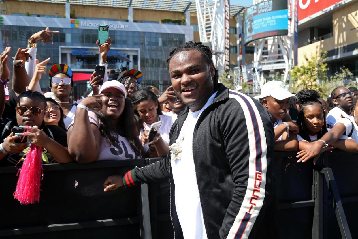 Rapper Tee Grizzley is mourning the loss of hs manager Jobina Brown after their car was shot at in Detroit on Tuesday: Getty Images for BET