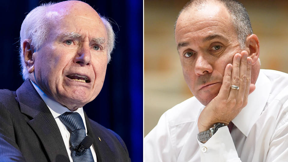 Pictured left to right, former Australian Prime Minister John Howard and short-lived Essendon CEO, Andrew Thorburn.