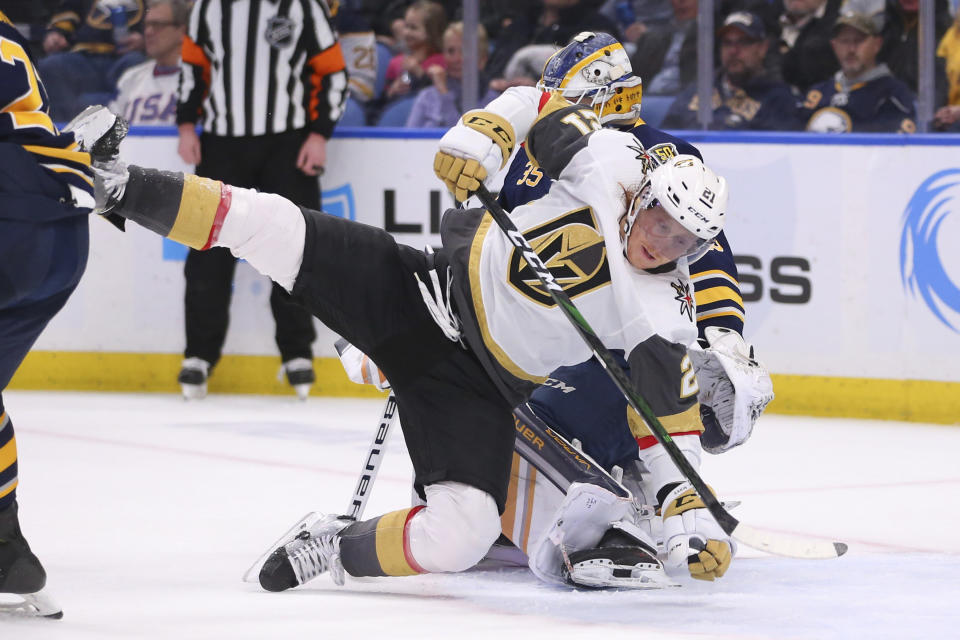 Buffalo Sabres goalie Linus Ullmark (35) brings down Vegas Golden Knights forward Cody Eakin (21) during the second period of an NHL hockey game Tuesday, Jan. 14, 2020, in Buffalo, N.Y. (AP Photo/Jeffrey T. Barnes)