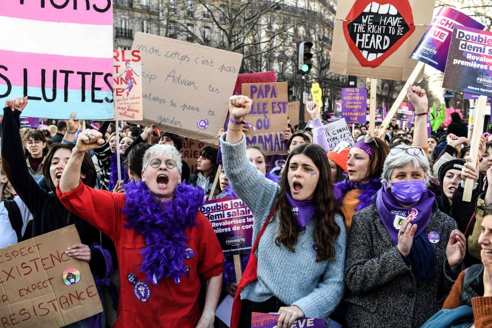 Demonstrators in Paris, France, take part in a rally for gender equality to mark International Women's Day on March 8. 2022.