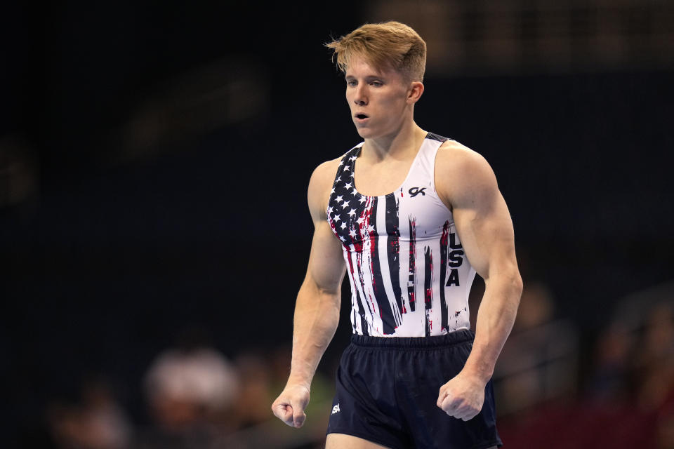 Shane Wiskus reacts after competing in the floor exercise during the men's U.S. Olympic Gymnastics Trials Thursday, June 24, 2021, in St. Louis. (AP Photo/Jeff Roberson)