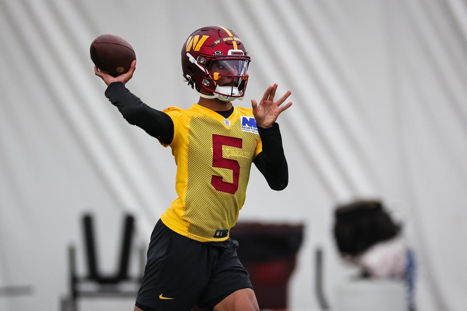 ASHBURN, VA - MAY 10: Jayden Daniels #5 of the Washington Commanders attempts a pass during Washington Commanders Rookie Minicamp at OrthoVirginia Training Center on May 10, 2024 in Ashburn, Virginia. (Photo by Scott Taetsch/Getty Images)