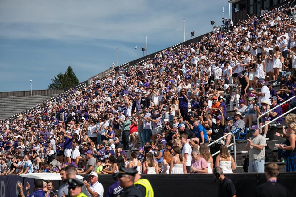 Holy Cross fans cheer after Jordan Fuller scored HC's first touchdown of the game Saturday at Fitton Field.