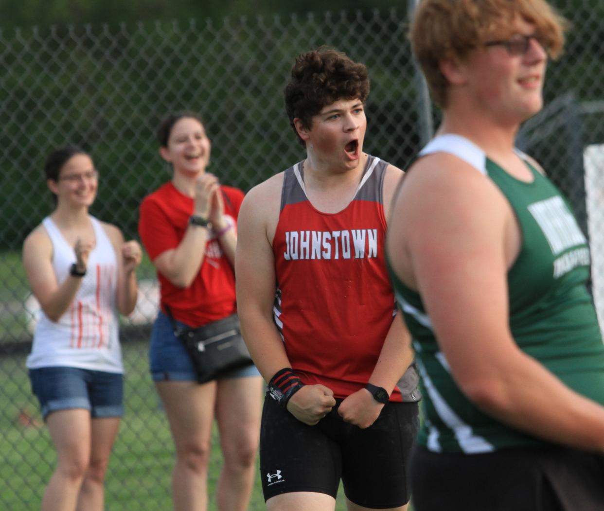 Johnstown's Alan Villa celebrates winning the shot put during the first day of the Licking County League-Cardinal Division championship at Heath on Wednesday, May 8, 2024.