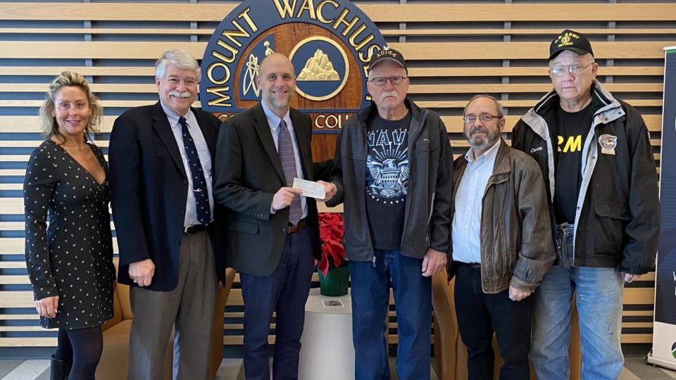 From left: MWCC Foundation Director Carla Zottoli, Director of Veterans Services, Robert Mayer, MWCC President James Vander Hooven and Vietnam Veterans of America Chapter 907 members John Kazinskas, James Benton III, and Charles Hodgkinson.