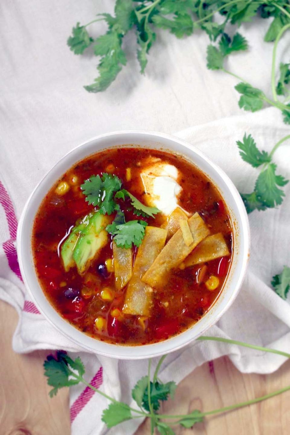 bowl of soup on a kitchen tea towl