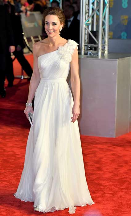 The Duchess of Cambridge had an ethereal red carpet moment at the BAFTAs on Sunday, wearing a stunning one-shouldered white evening dress. The floor-length gown, which featured a cinched-in waist and beautiful floral applique detail, saw Kate named as one of the best dressed of the night, holding her own against some of the biggest Hollywood stars.