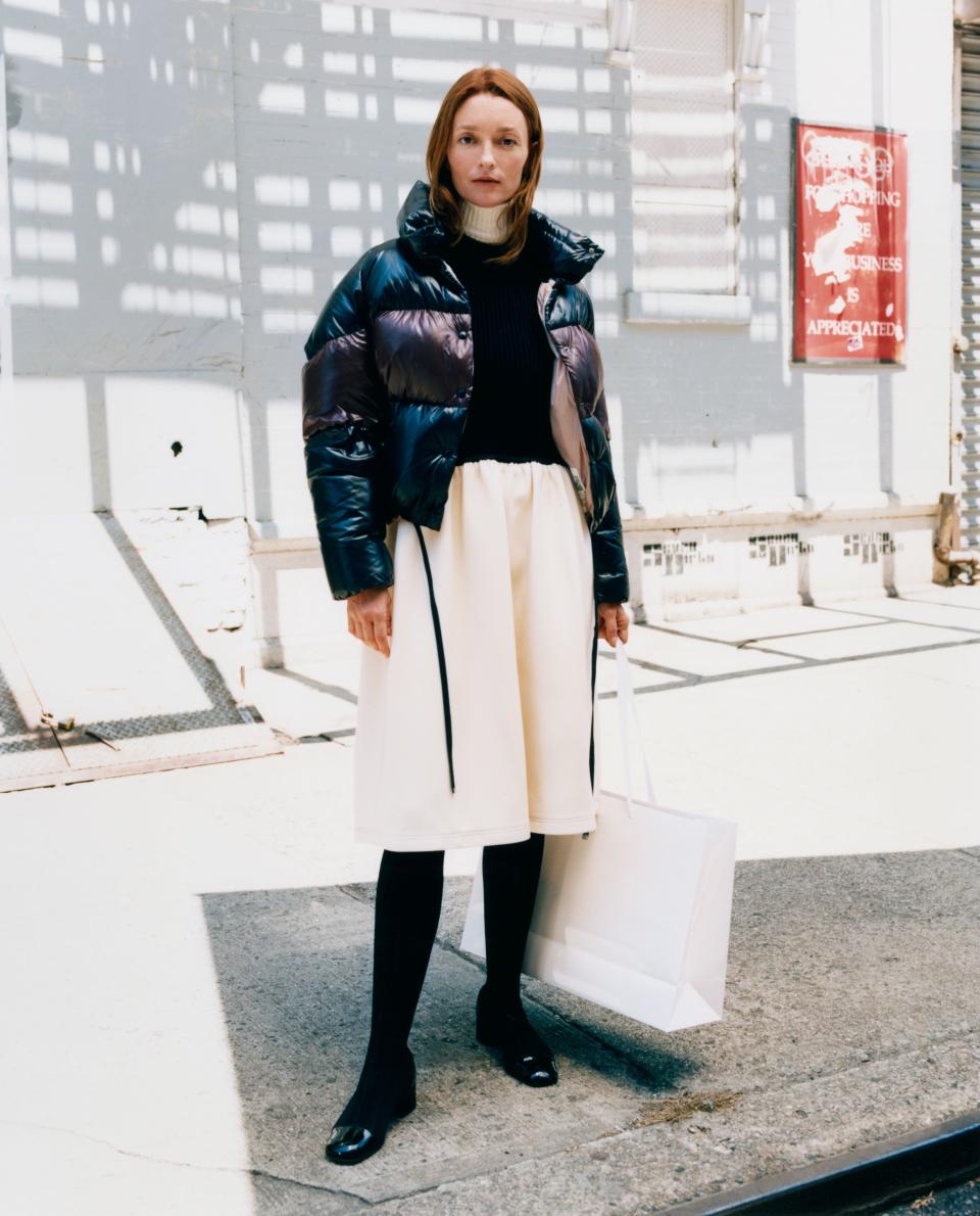 Audrey Marnay does some shopping in Chinatown in her Moncler jacket.