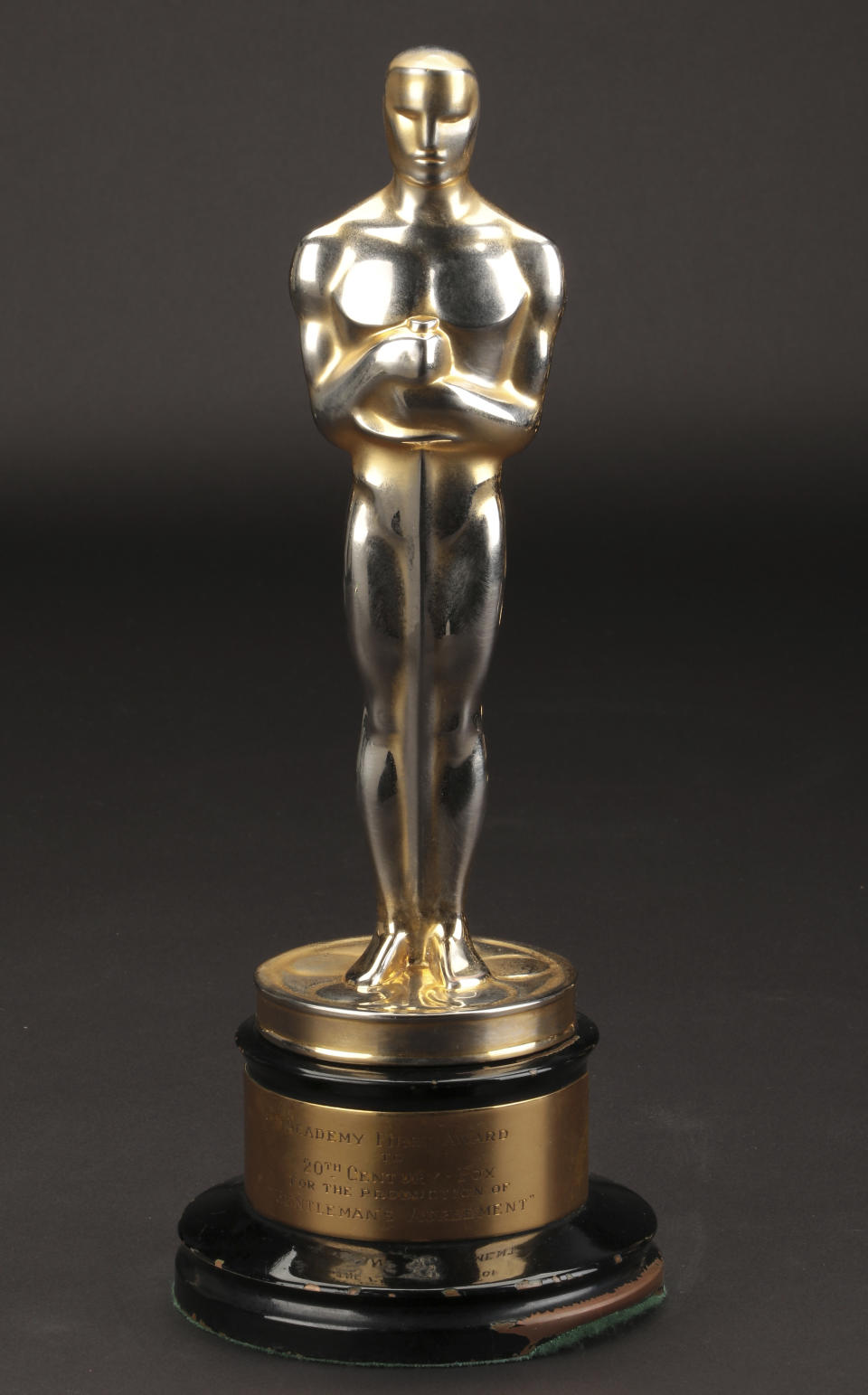 FILE - This undated file image provided by Profiles in History shows the best picture Academy Award for "Gentleman's Agreement." The best-picture Oscar for "Gentleman's Agreement," the 1947 film starring Gregory Peck that took on anti-Semitism, sold for $492,000, in a rare auction of Oscars that ended Friday, Dec. 14, 2018, in Los Angeles. (Lou Bustamante/Profiles in History via AP, File)