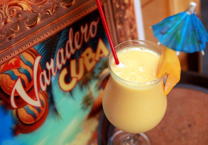 An accessorized mango shake at Copacabana Cuban restaurant in Abacoa, Jupiter.