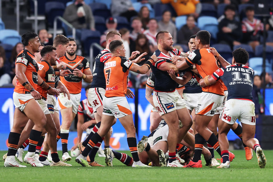 SYDNEY, AUSTRALIA - AUGUST 26:  Jared Waerea-Hargreaves of the Roosters scuffles with Tigers players during the round 26 NRL match between Sydney Roosters and Wests Tigers at Allianz Stadium on August 26, 2023 in Sydney, Australia. (Photo by Matt King/Getty Images)