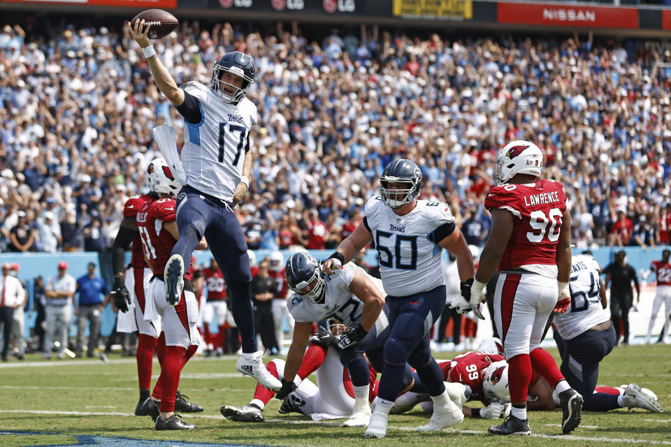 Tennessee Titans quarterback Ryan Tannehill (17) celebrates after scoring a touchdown against the Arizona Cardinals in the first half of an NFL football game Sunday, Sept. 12, 2021, in Nashville, Tenn. (AP Photo/Wade Payne)