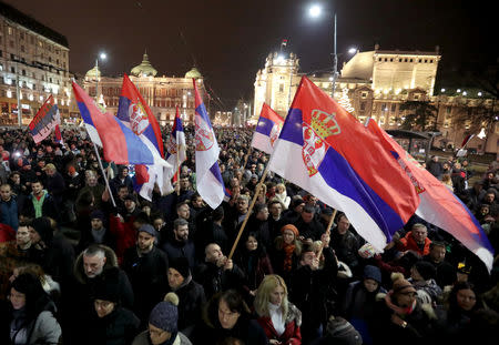 Demonstrators holding Serbian flags attend an anti-government protest in central Belgrade, Serbia, December 29, 2018. REUTERS/Marko Djurica