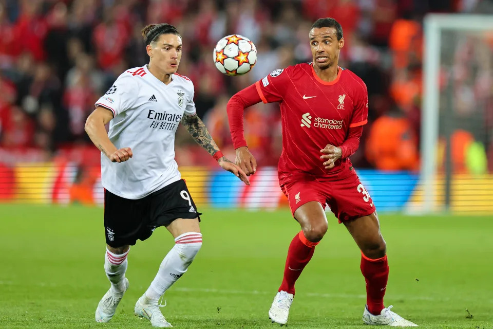 LIVERPOOL, ENGLAND - APRIL 13: Darwin Nunez of Benfica and Joel Matip of Liverpool during the UEFA Champions League Quarter Final Leg Two match between Liverpool FC and SL Benfica at Anfield on April 13, 2022 in Liverpool, United Kingdom. (Photo by Robbie Jay Barratt - AMA/Getty Images)