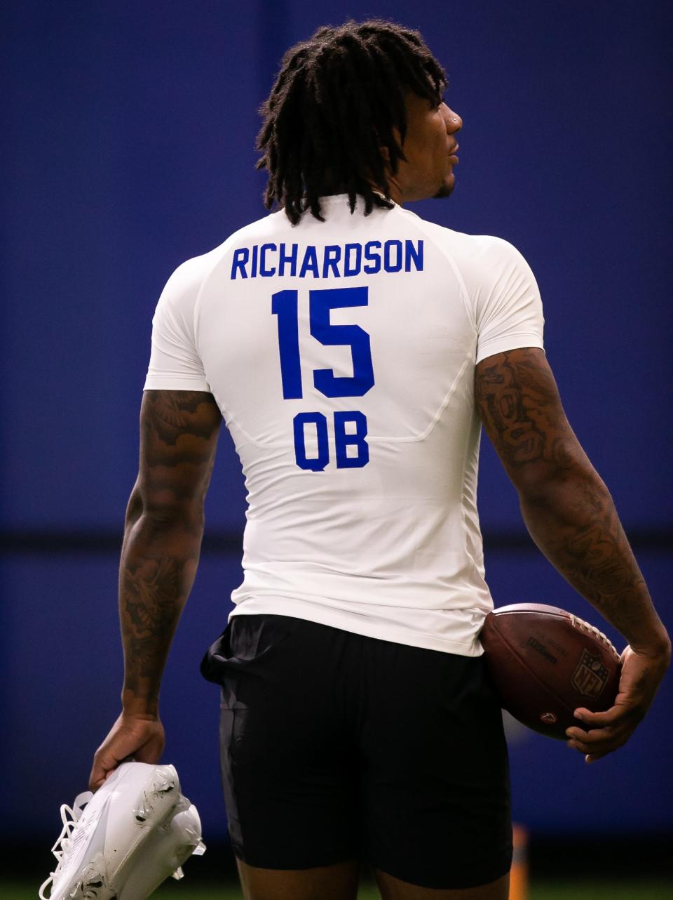 Florida Gators quarterback Anthony Richardson (15) walks on the field to warm up during the 2023 NFL Pro Day held at Condron Family Indoor Practice Facility in Gainesville, FL on Thursday, March 30, 2023. Richardson will meet with six NFL teams. They are the Panthers, Colts, Titans, Raiders, Falcons and Ravens. [Doug Engle/Gainesville Sun]