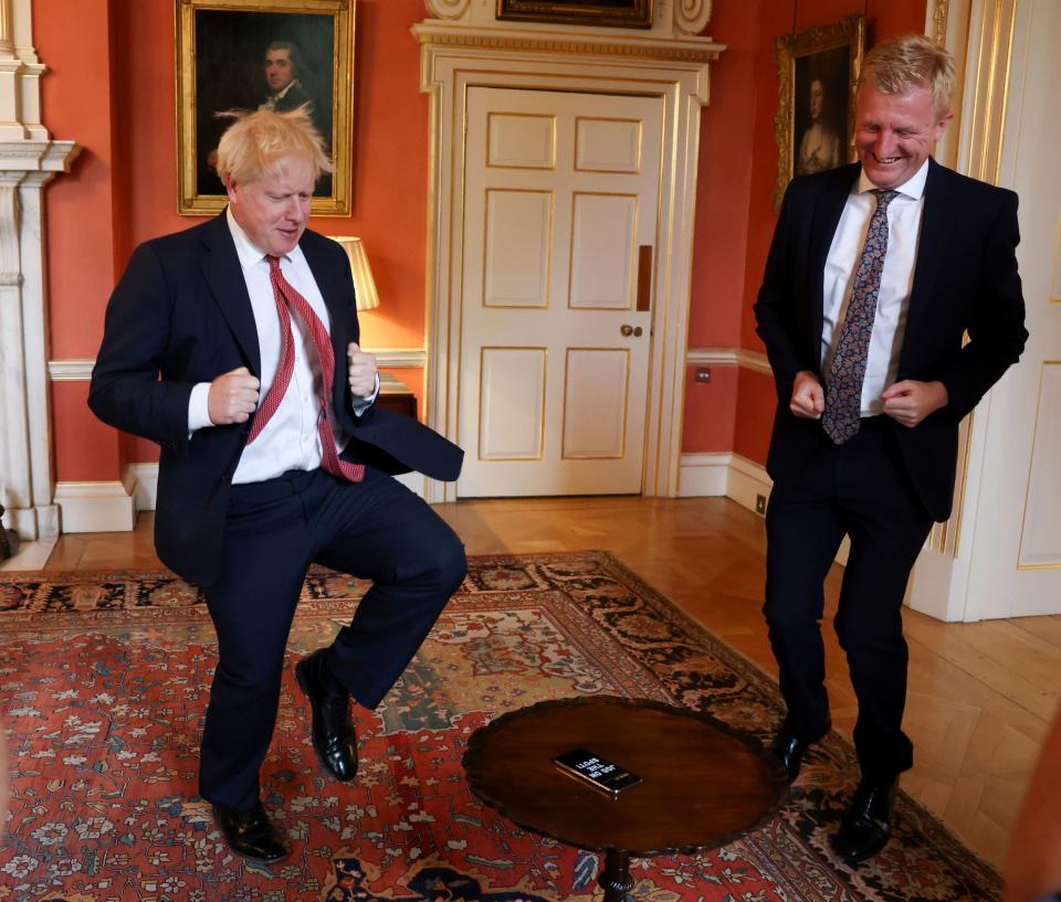 Boris Johnson and Oliver Dowden try out the Caper App at the London Tech Week Showcase - Andrew Parsons