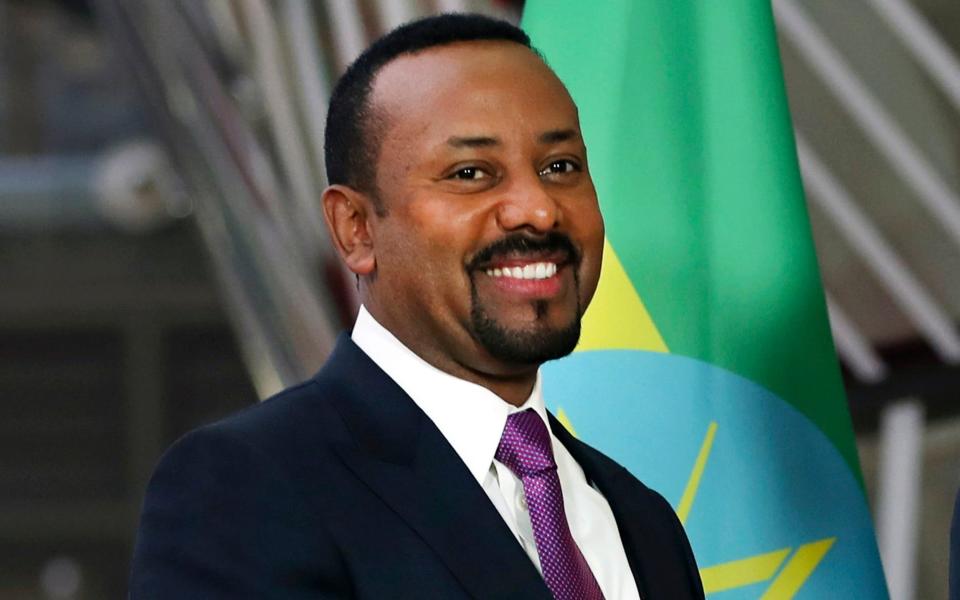 Ethiopian Prime Minister Abiy Ahmed, at the European council headquarters in 2019, is accused of a brutal crackdown on dissent  - Francisco Seco/AP