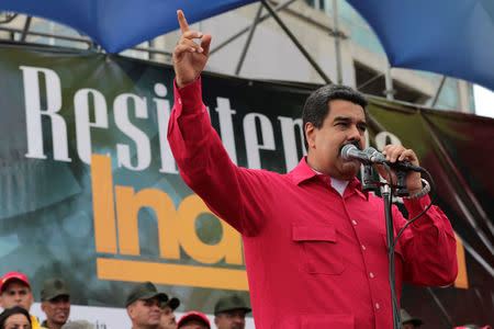 Venezuela's President Nicolas Maduro attends a rally to commemorate the National Day of Indian Resistance in Caracas, Venezuela October 12, 2016. Miraflores Palace/Handout via REUTERS