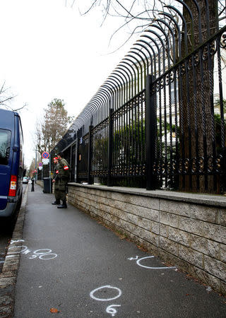 Members of the Austrian armed forces stand in front of the Iranian ambassador's residence in Vienna, Austria March 12, 2018. REUTERS/Leonhard Foeger