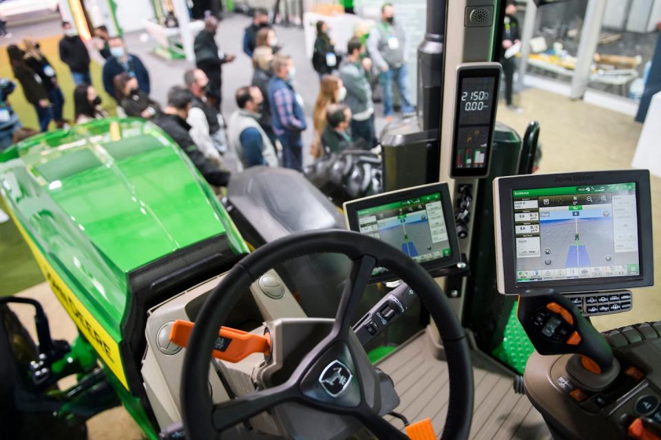 New tractors are increasingly high-tech, with GPS, 360-degree camera and smartphone controls. <a href="https://www.gettyimages.com/detail/news-photo/inside-the-cab-of-the-deer-co-john-deere-8r-fully-news-photo/1237542314" rel="nofollow noopener" target="_blank" data-ylk="slk:Patrick T. Fallon/AFP via Getty Images;elm:context_link;itc:0;sec:content-canvas" class="link ">Patrick T. Fallon/AFP via Getty Images</a>