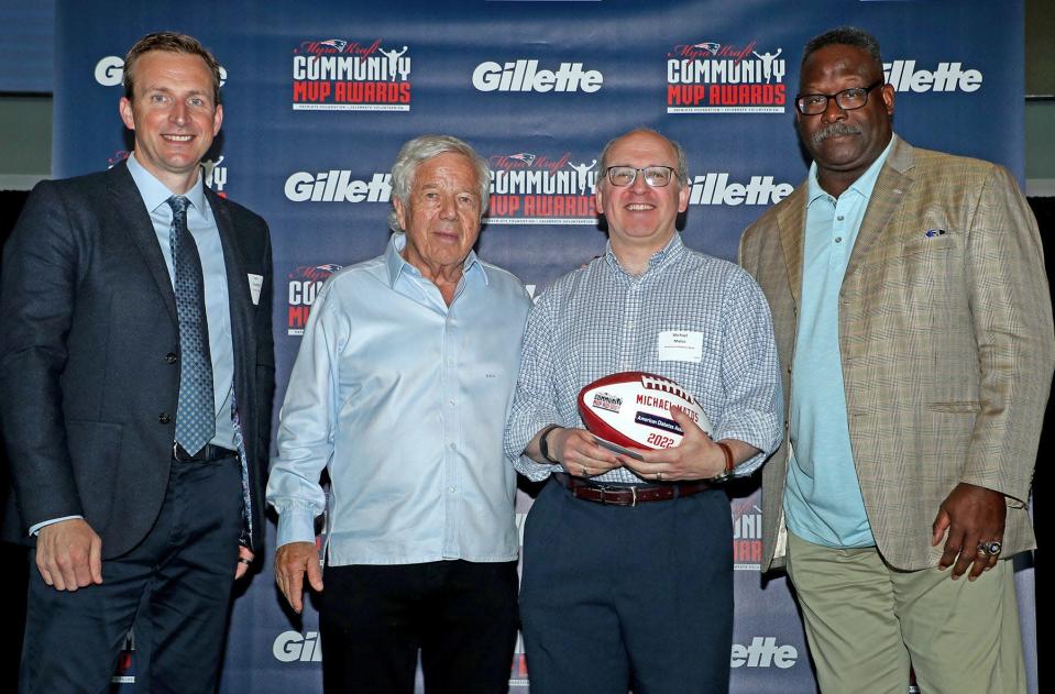 Procter &amp; Gamble’s VP of Grooming, North America, John Claughton (far left), Patriots Chairman and CEO Robert Kraft and Patriots and Pro Football Hall of Famer Andre Tippett congratulate Huggins Hospital Pediatrician, Michael Matos, MD, for being selected as a 2022 Myra Kraft Community MVP Award winner.