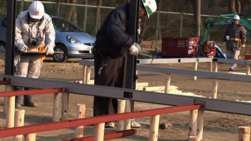 Construction is underway in Rikuzentakata, one of the towns worst hit by Japan's earthquake and tsunami. Temporary homes are being built for those in evacuation centres, many who have lost everything. 