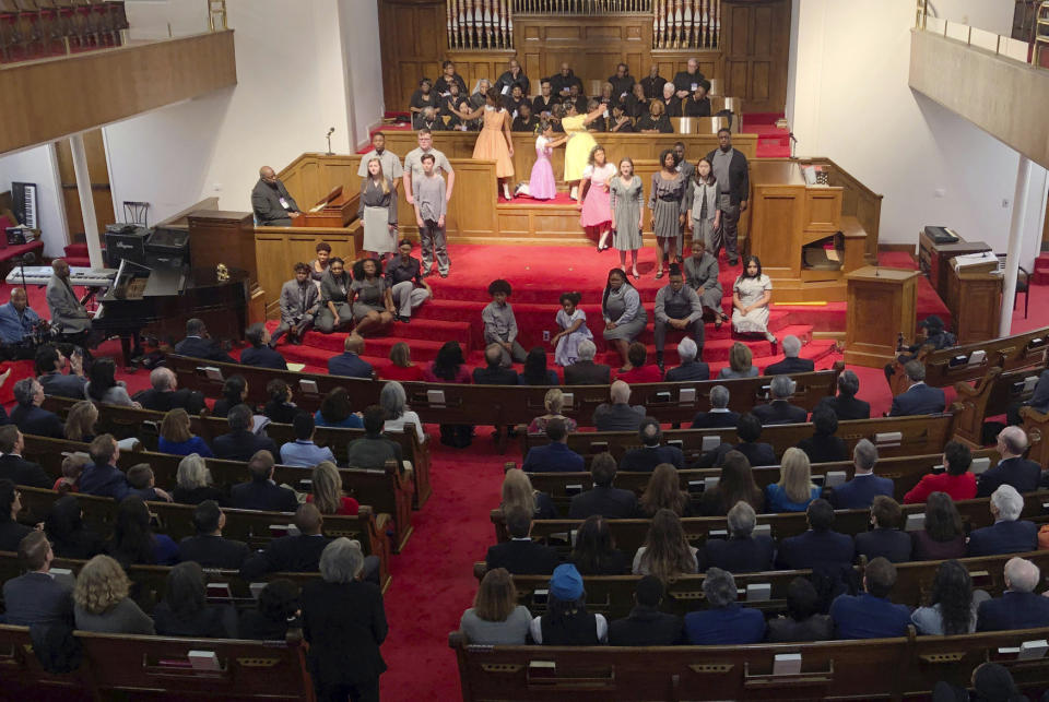 Members of Congress and others watch a play depicting the lives of four girls killed in a 1963 bombing at 16th Street Baptist Church in Birmingham, Ala., on Friday, March 1, 2019. Dozens of members of Congress are participating in a weekend-long pilgrimage civil rights pilgrimage through the state. (AP Photo/Jay Reeves)