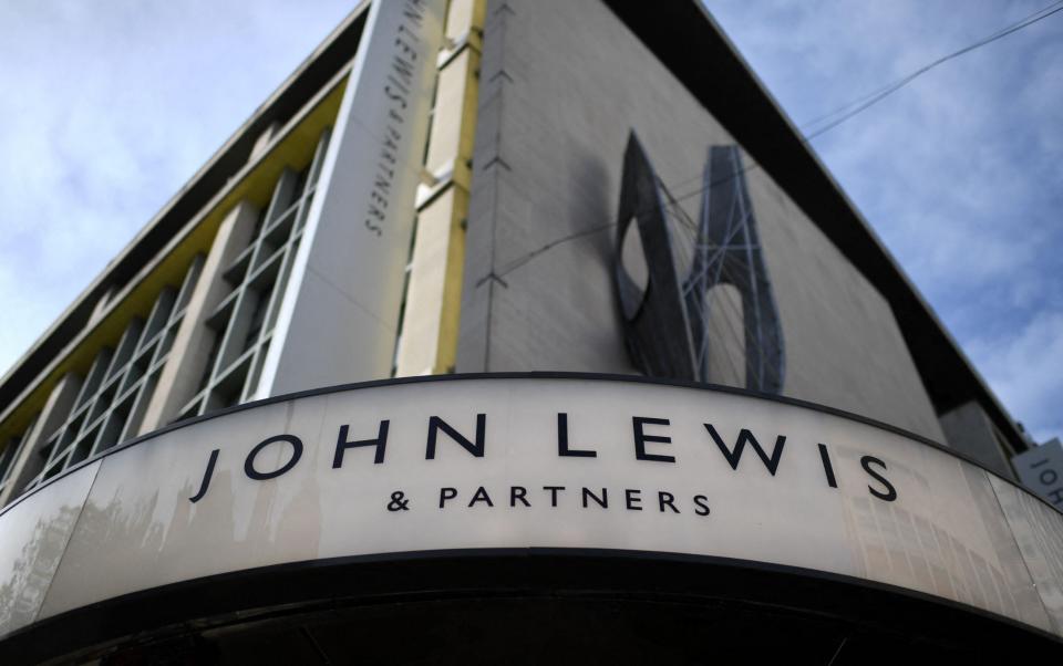 The front of John Lewis department store is pictured on Oxford Street in central London on the afternoon of March 21, 2020, as the store announced it was to close all 50 stores temporarily on Monday. - John Lewis, one of the biggest names on the British high street, is to temporarily close its 50 department stores nationwide because of the coronavirus crisis, it announced on Saturday. (Photo by Daniel LEAL / AFP) (Photo by DANIEL LEAL/AFP via Getty Images) - DANIEL LEAL/AFP via Getty Images