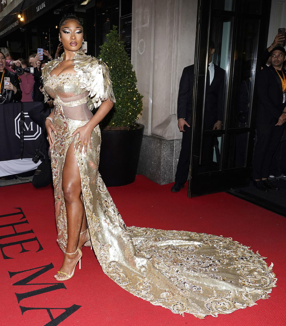 Megan Thee Stallion, wearing Moschino, departs The Mark Hotel prior to attending The Metropolitan Museum of Art’s Costume Institute benefit gala celebrating the opening of “In America: An Anthology of Fashion” on Monday, May 2, 2022, in New York. (Photo by Charles Sykes/Invision/AP) - Credit: Charles Sykes/Invision/AP