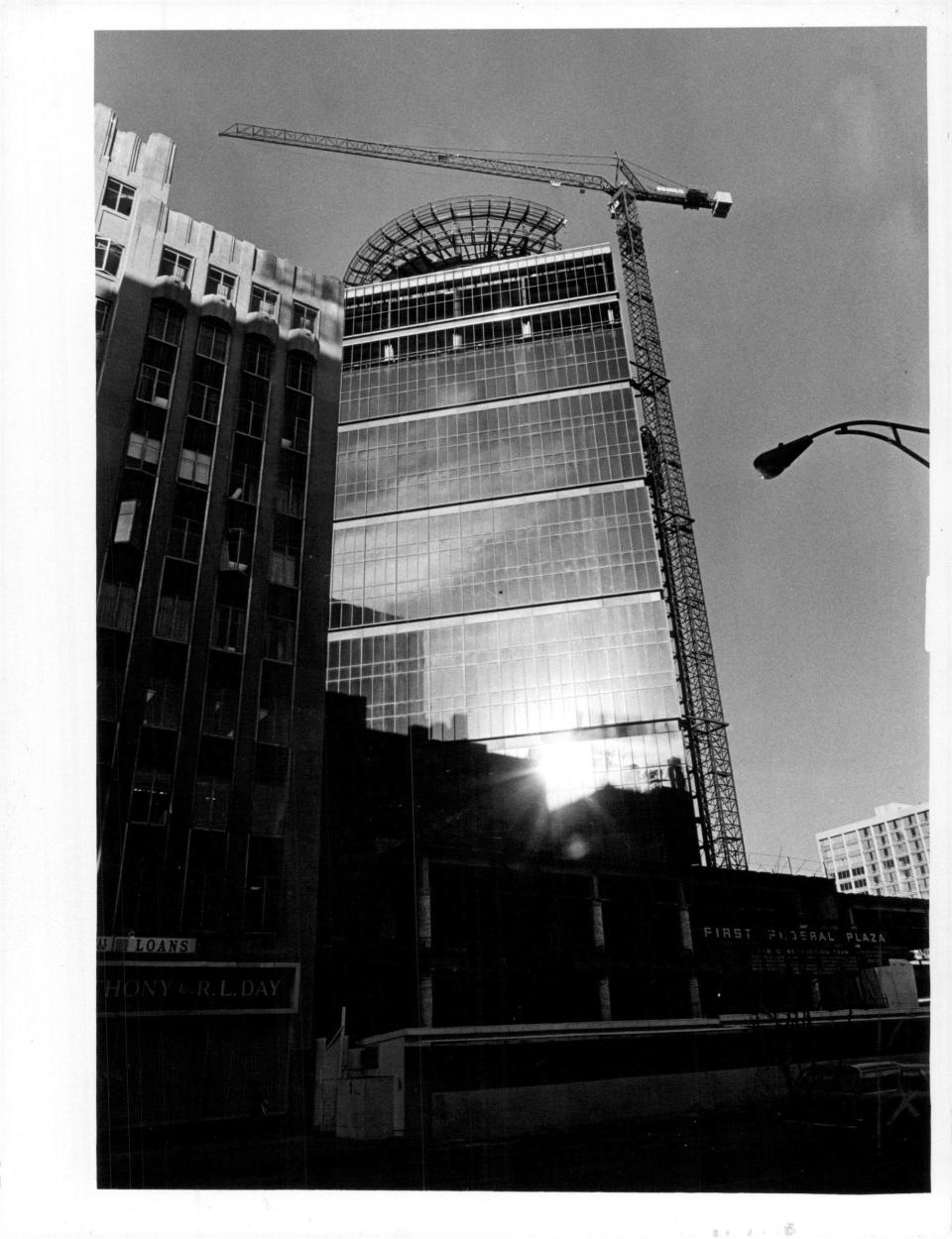 First Federal Plaza and The Changing Scene under construction in 1976.