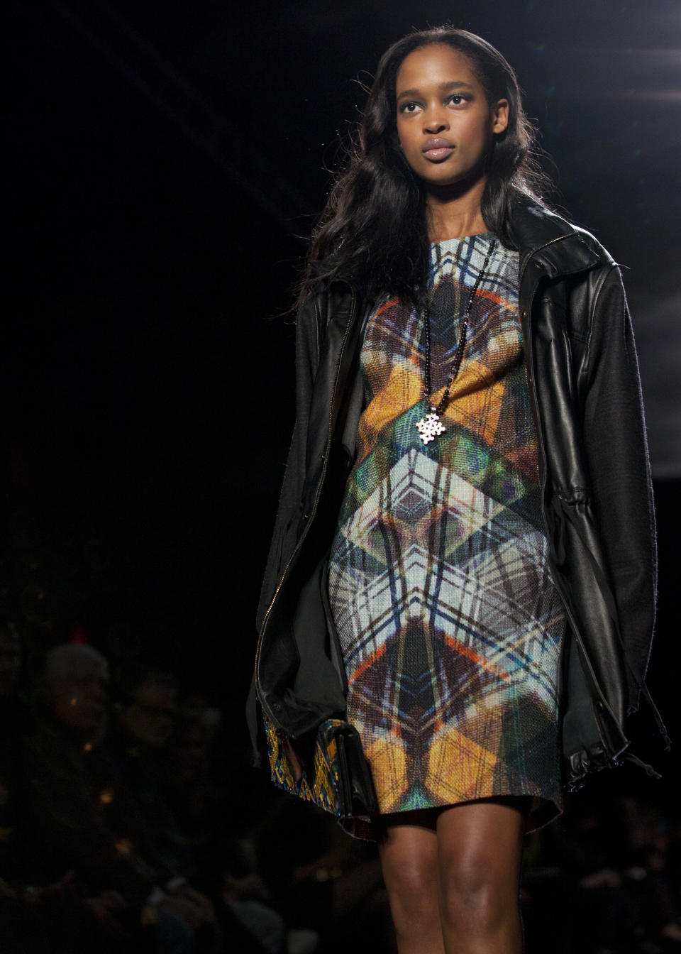 A model walks the runway during the Nicole Miller Fall 2013 fashion show during Fashion Week, Friday, Feb. 8, 2013, in New York. (AP Photo/Karly Domb Sadof)