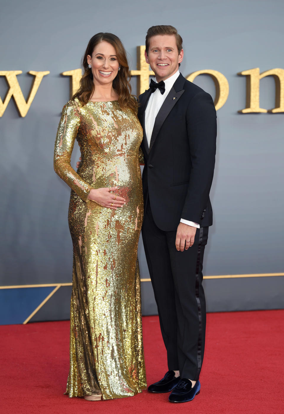 Jessica Blair Herman and husband Allen Leech, who plays Tom Branson in the hit series, attend the "Downton Abbey" World Premiere at Cineworld Leicester Square [Photo: Getty]