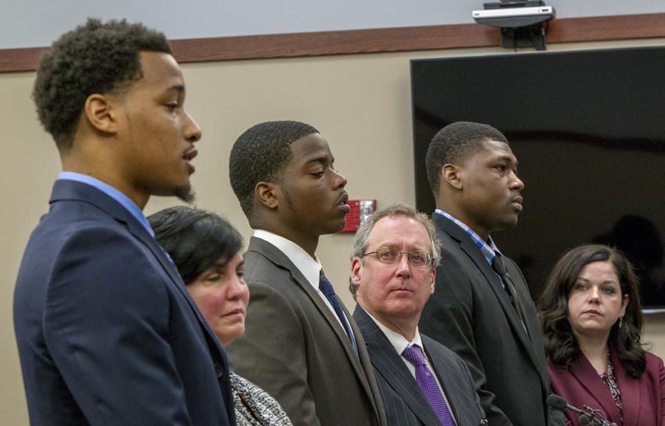 Former Michigan State University football players, from left, Demetric Vance, Donnie Corley and Josh King all pleaded guilty to a felony charge of seduction in a sexual assault case. (Cory Morse /The Grand Rapids Press via AP)