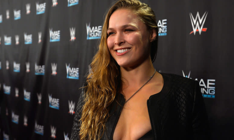 Ronda Rousey posing for a photo on the red carpet.