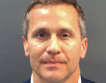 FILE PHOTO: Missouri Governor Eric Greitens appears in a police booking photo in St. Louis, Missouri, U.S., February 22, 2018. St. Louis Metropolitan Police Dept./Handout via REUTERS/File Picture