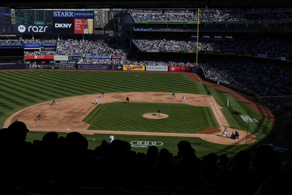 Fans watch as the Toronto Blue Jays play the New York Yankees during the sixth inning of a baseball game Sunday, April 7, 2024, in New York. (AP Photo/Frank Franklin II)