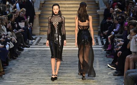 Models wear creations by Julien Macdonald for the Autumn/Winter 2015 collection at London Fashion Week in London February 21, 2015. REUTERS/Toby Melville