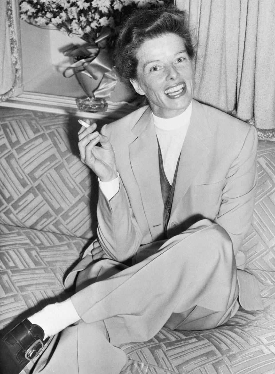 Hepburn wears a suit for a press conference in 1952.