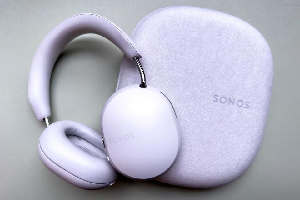 the sonos headphones laid over their carrying case