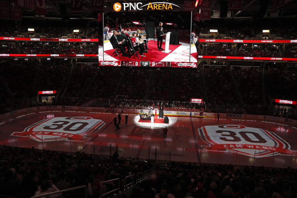 Former Carolina Hurricanes goalie Cam Ward speaks to the crowd at a ceremony for his induction into the Hurricanes Hall of Fame prior to an NHL hockey game against the Montreal Canadiens in Raleigh, N.C., Thursday, Feb. 16, 2023. (AP Photo/Karl B DeBlaker)