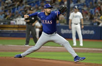 Texas Rangers starter Dane Dunning pitches against the Tampa Bay Rays during the first inning of a baseball game Monday, April 1, 2024, in St. Petersburg, Fla. (AP Photo/Steve Nesius)