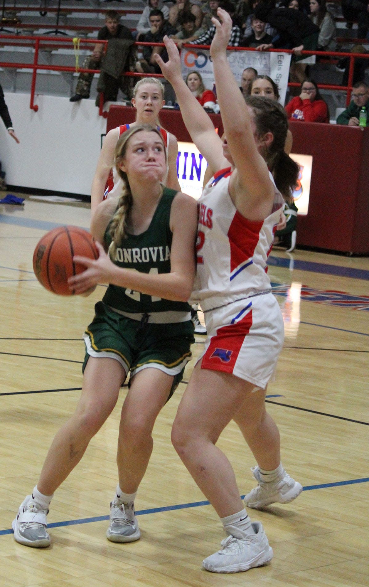 Monrovia junior Ashley Lewis posts up in the paint during Wednesday's Powder Keg game at Eminence. 