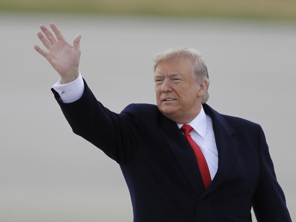 President Donald Trump waves after arriving in Indianapolis to speak at the 91st Annual Future Farmers of America Convention and Expo, Saturday, Oct. 27, 2018, in Indianapolis. (AP Photo/Darron Cummings)