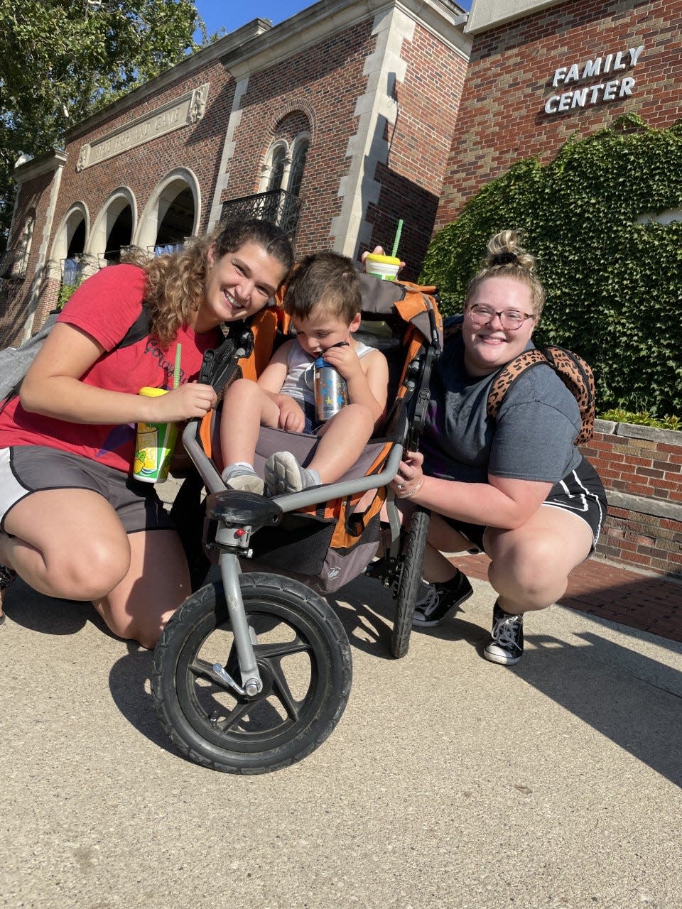 Cassi Walker of Indianola (left) explored the Iowa State Fair during sensory-friendly morning in 2022 with her son, Raymond Walker, and friend Elizabeth Olsen of Des Moines.