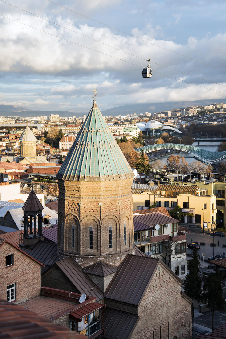 Aerial view of Tbilisi with Narikala Fortress, cable car, and historical architecture
