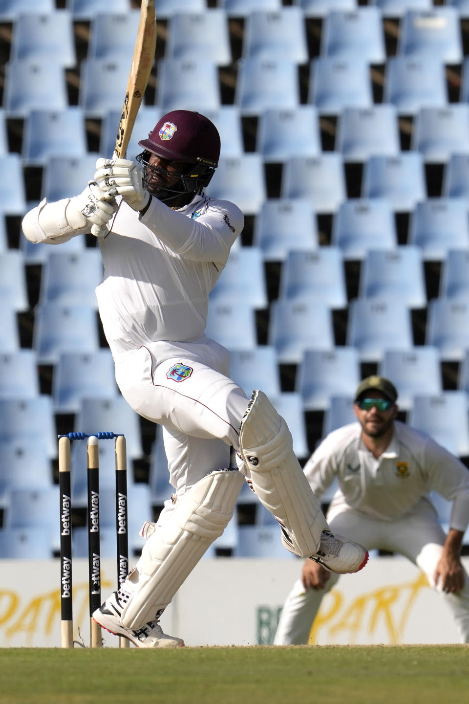 West Indies's batsman Kyle Mayers watches his shot during the second day of the first test cricket match between South Africa and West Indies, at Centurion Park in Pretoria, South Africa, Wednesday, March 1, 2023. (AP Photo/Themba Hadebe)